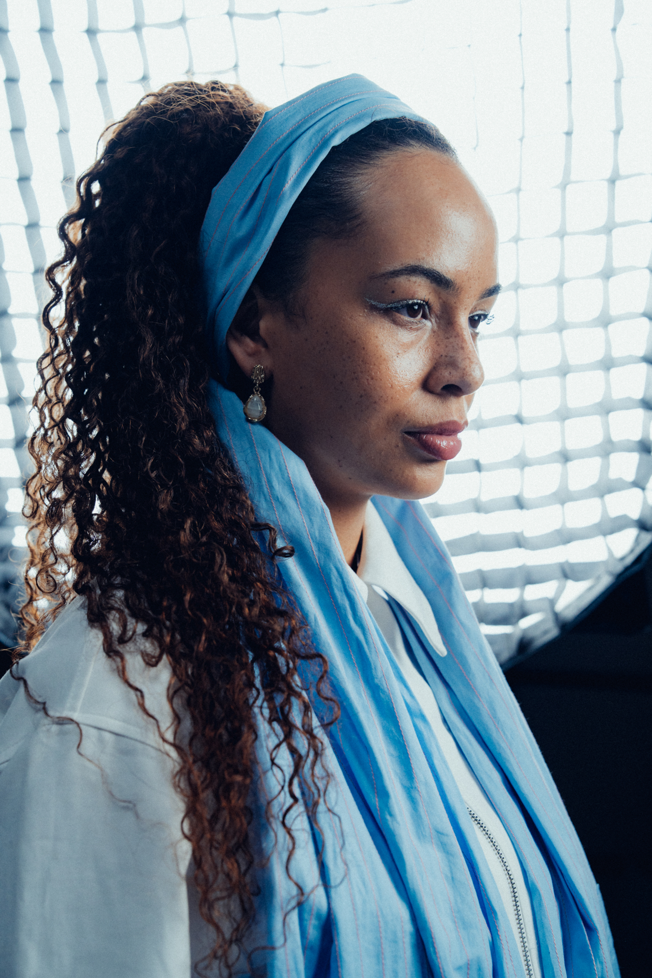 Editorial portrait with blue styling