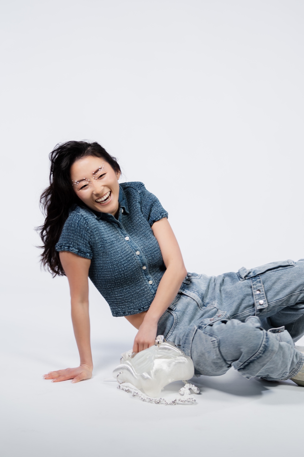Denim editorial with shell bag
