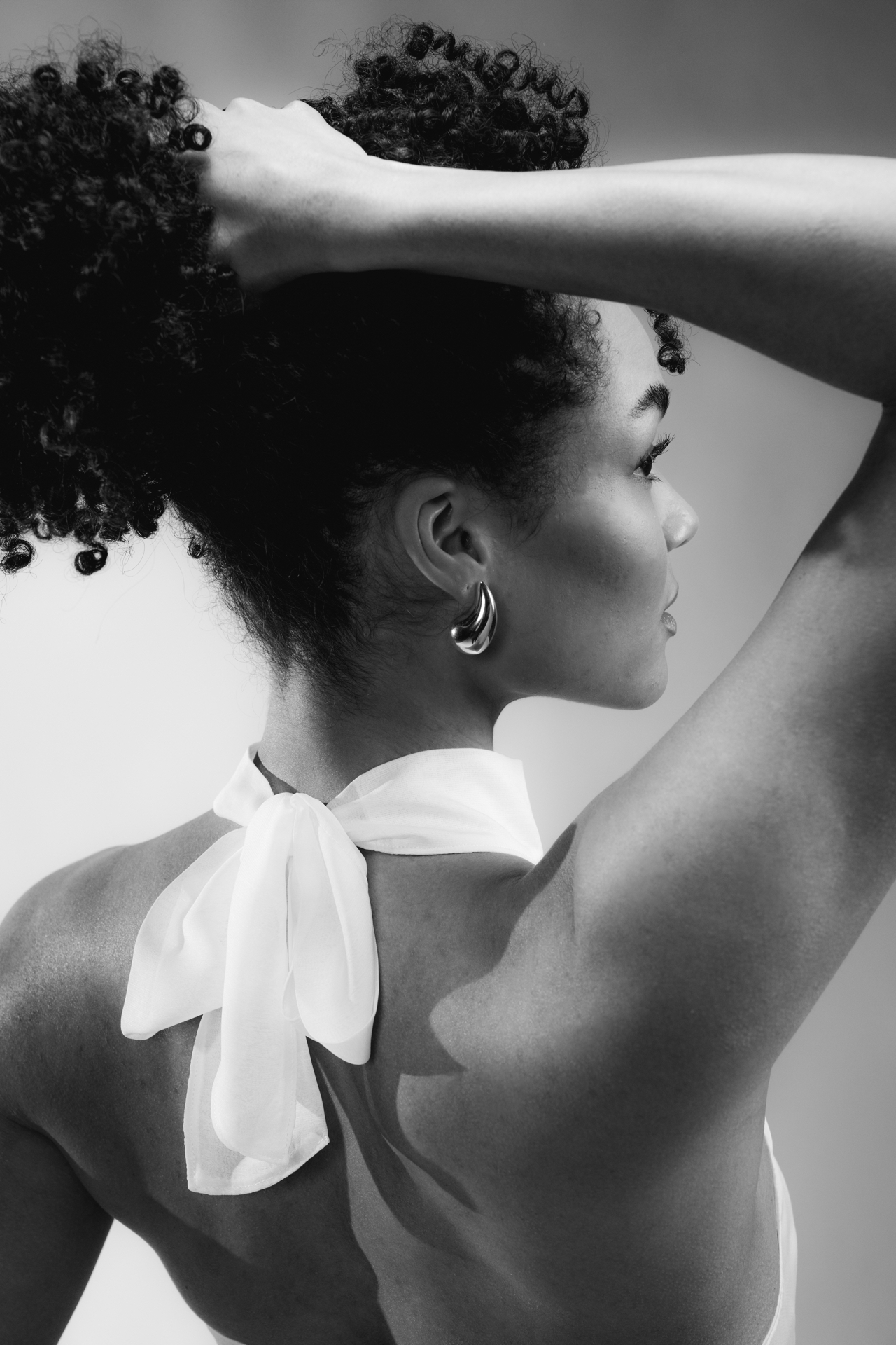 Studio portrait, back detail with silk bow